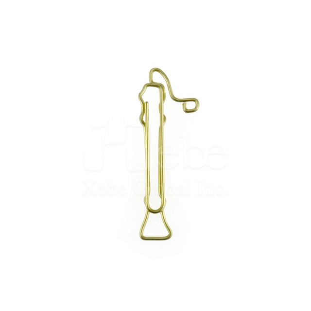 Gold color bass recorder shaped paperclip