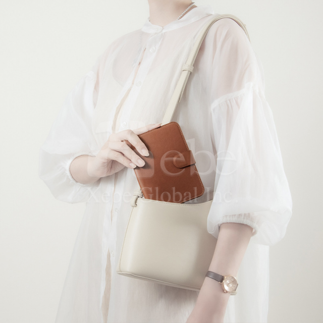 brown leather passport holder