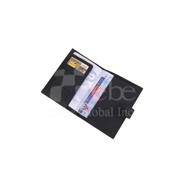 black leather passport holder
