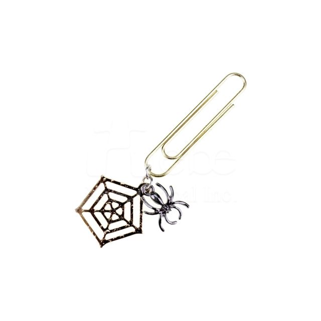 spider web charm shaped like a paperclip