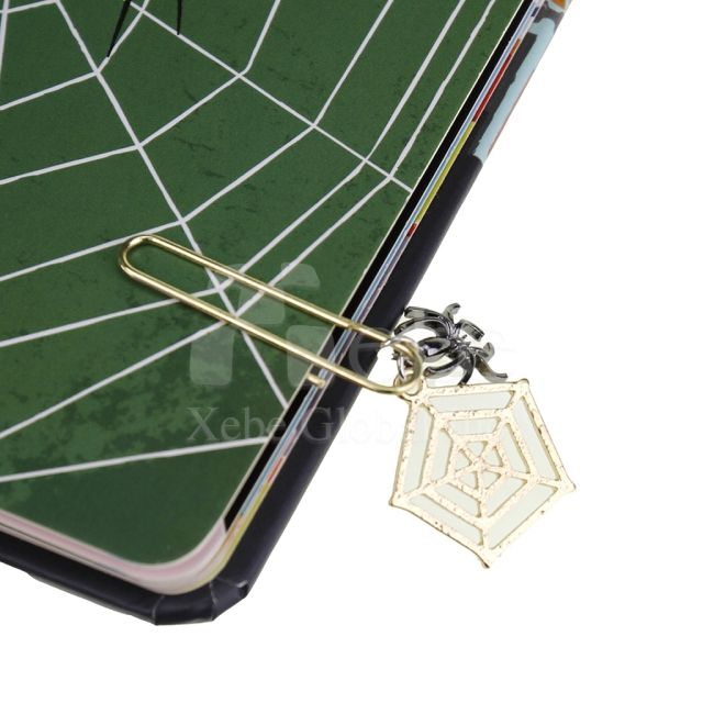 spider web charm shaped like a paperclip