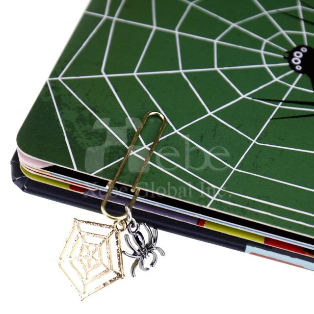spider web charm shaped like a paperclip